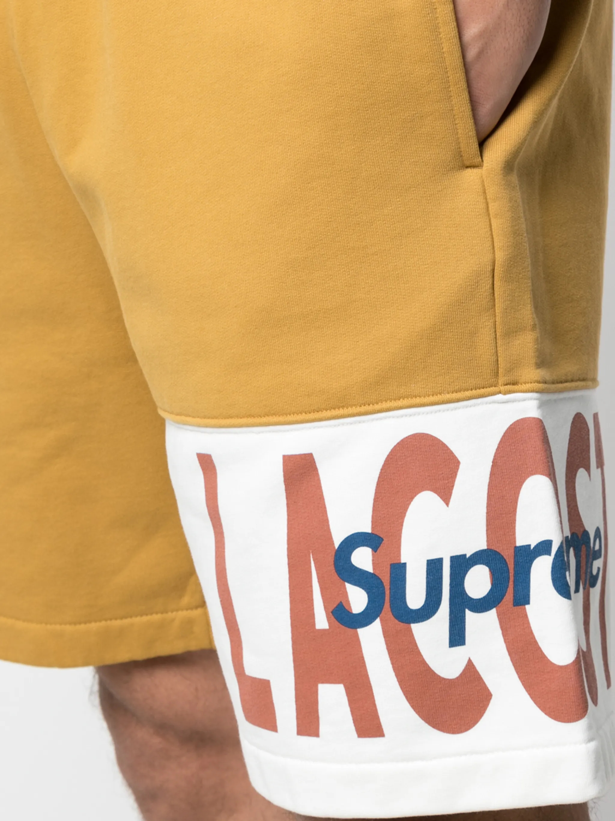 Supreme x Lacoste logo-panel track shorts side view